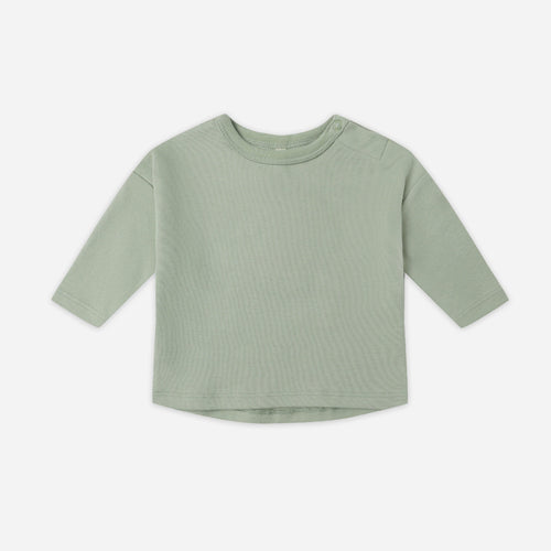 Green long-sleeve shirt on a white background