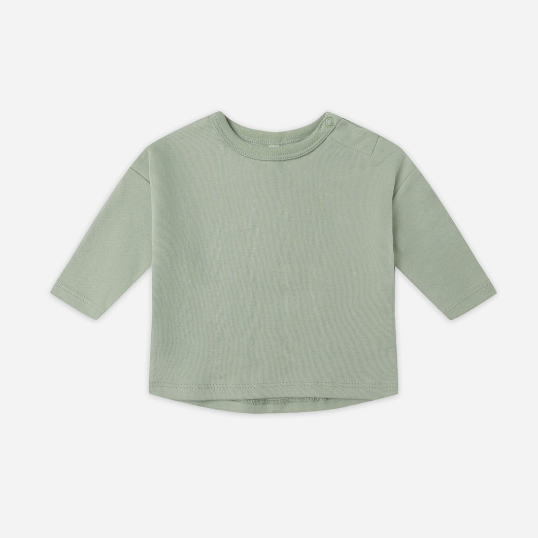 Green long-sleeve shirt on a white background