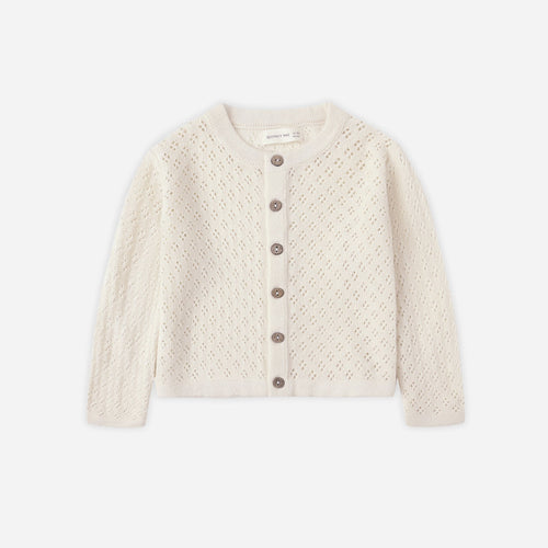 Beige knitted cardigan on a white background