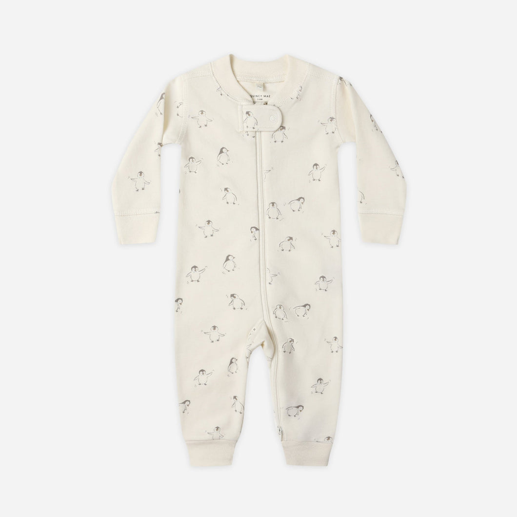 Baby onesie with subtle pattern on a white background