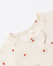 Load image into Gallery viewer, Quincy Mae bamboo zip footie sleepsuit with letter designs for babies, made from soft, eco-friendly fabric for comfortable sleep.