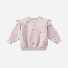 Load image into Gallery viewer, Pink baby sweater with bow patterns on a white background