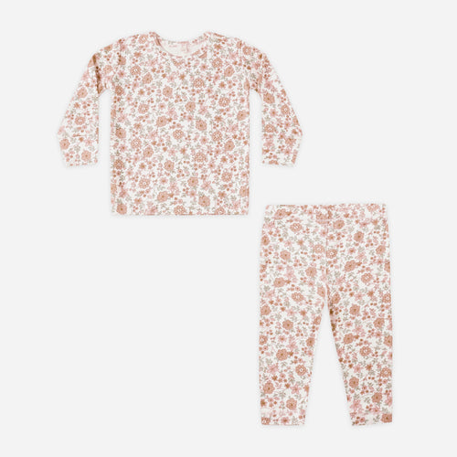 Floral pajama set with top and pants on a white background