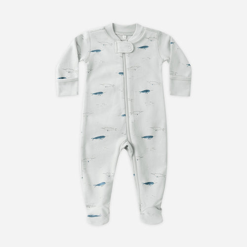 Baby onesie with fish pattern on a white background