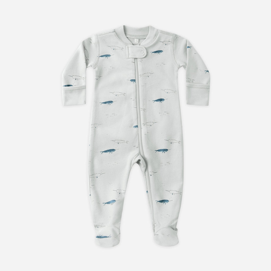 Baby onesie with fish pattern on a white background