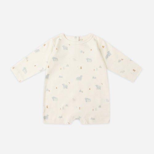 Baby romper with long sleeves and pattern on a white background