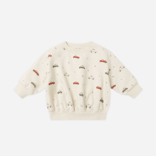Children's sweatshirt with car pattern on a white background