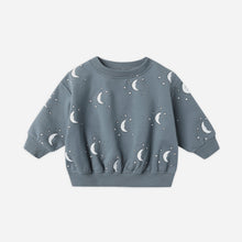 Load image into Gallery viewer, Blue children&#39;s sweatshirt with moon pattern on a light gray background