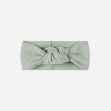Load image into Gallery viewer, Green headband with a knot on a white background