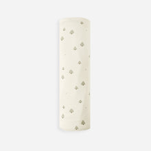Load image into Gallery viewer, White cylindrical object with small holes on a light beige background