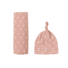 Load image into Gallery viewer, Pink hearts bamboo swaddle and knotted hat set by Quincy Mae, soft bedding for babies with cute heart pattern.