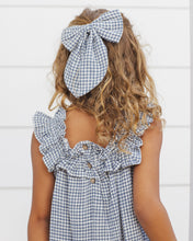 Load image into Gallery viewer, Rylee+Cru oversized bow marine gingham headband with large bow detail, styled on a model for a casual, playful look