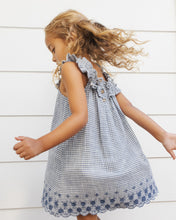 Load image into Gallery viewer, Rylee+Cru oversized bow marine gingham headband with large bow detail on a model, perfect for casual and stylish wear
