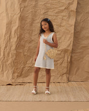 Load image into Gallery viewer, Straw shell purse bag by Rylee+Cru featuring a woven shell design with a rounded shape and adjustable strap.