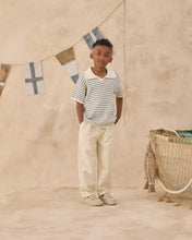 Load image into Gallery viewer, Rylee+Cru Chandler Knit Polo top in marine stripe with long sleeves and ribbed collar, laid flat on a white background.
