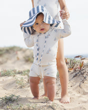 Load image into Gallery viewer, Rylee+Cru navy stripe floppy swim hat with wide brim and soft fabric, perfect for sun protection during outdoor activities.