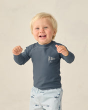 Load image into Gallery viewer, Baby and toddler navy long sleeve rashguard by Rylee+Cru, featuring a comfortable swimwear design with full-length sleeves.