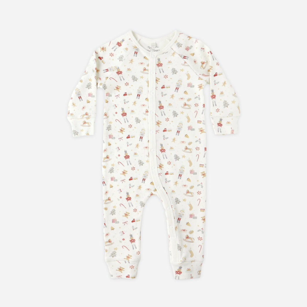 Floral-patterned onesie on a white background