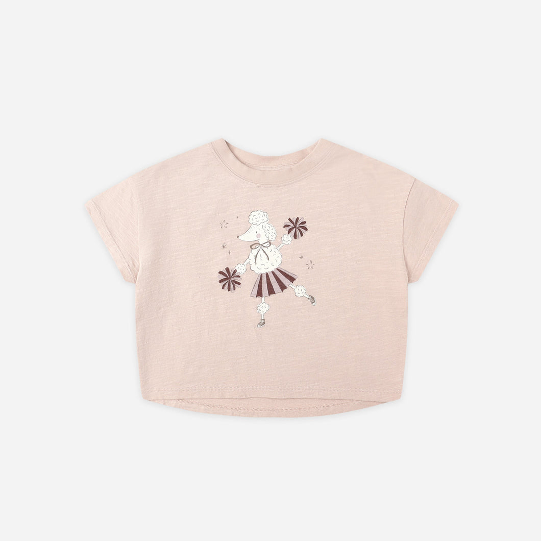 Pink t-shirt with a graphic design on a white background