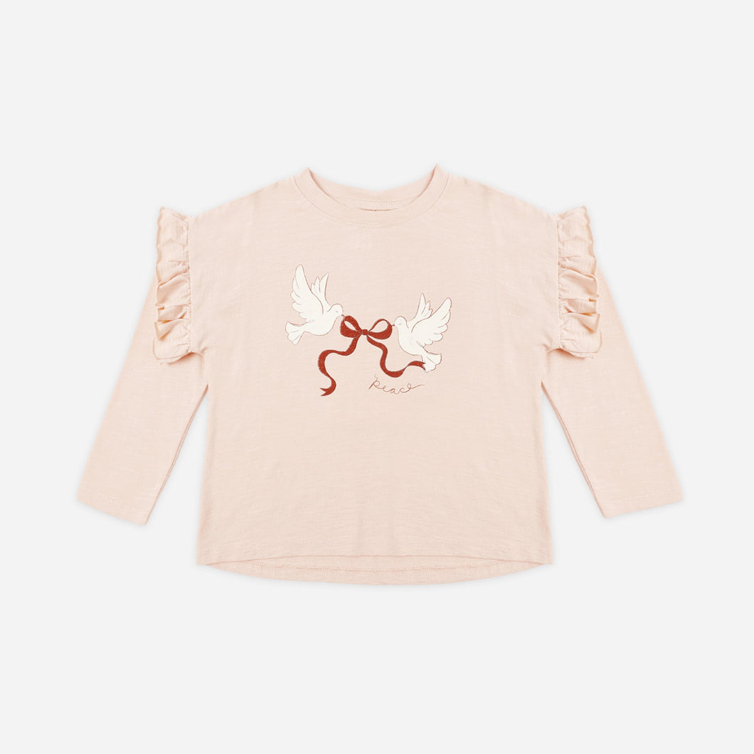 Pink long-sleeve top with a graphic design on a white background