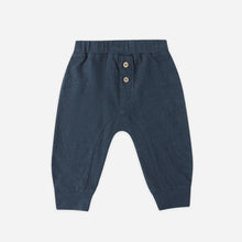 Load image into Gallery viewer, Navy blue baby pants with button details on a white background