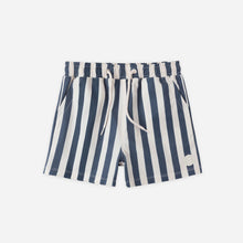 Load image into Gallery viewer, Baby boy wearing Rylee+Cru navy stripe boardshorts from the Baby &amp; Toddler Swimwear collection.