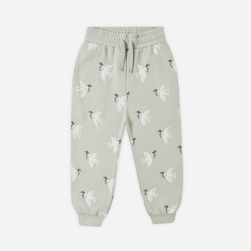 Light gray sweatpants with a subtle pattern on a white background