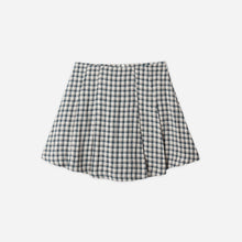 Load image into Gallery viewer, Black and white checkered skirt on a light gray background