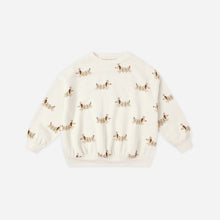 Load image into Gallery viewer, White sweater with small patterns on a light beige background