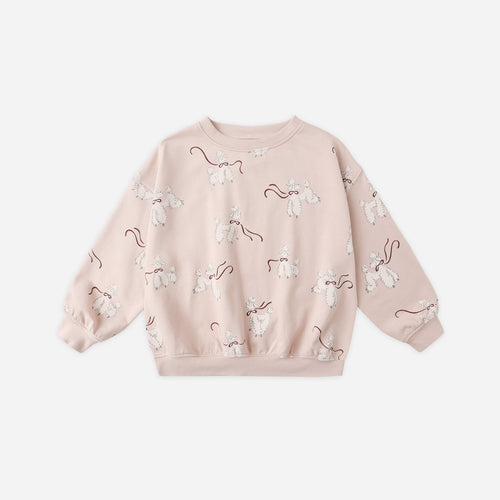 Pink sweatshirt with floral patterns on a white background