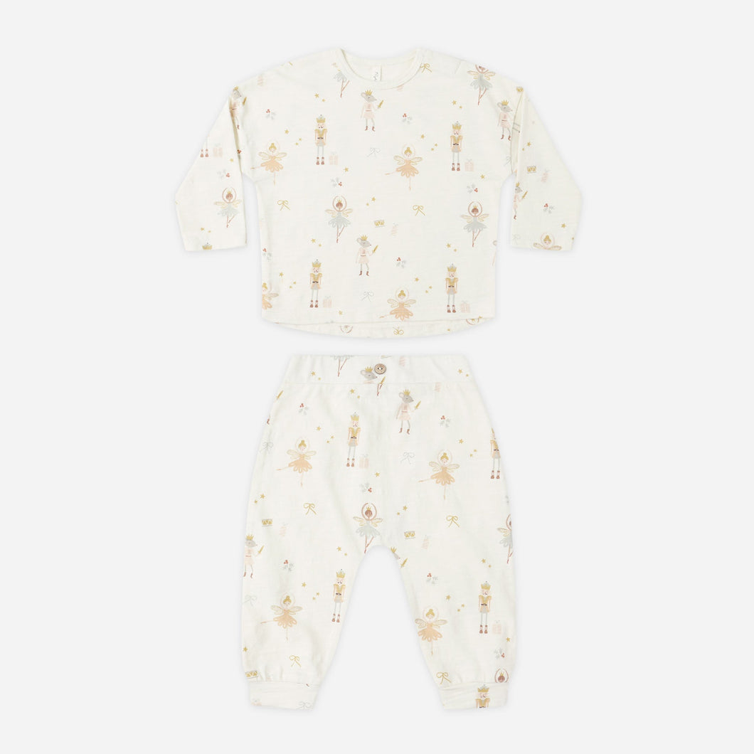 Baby onesie with floral pattern on a white background