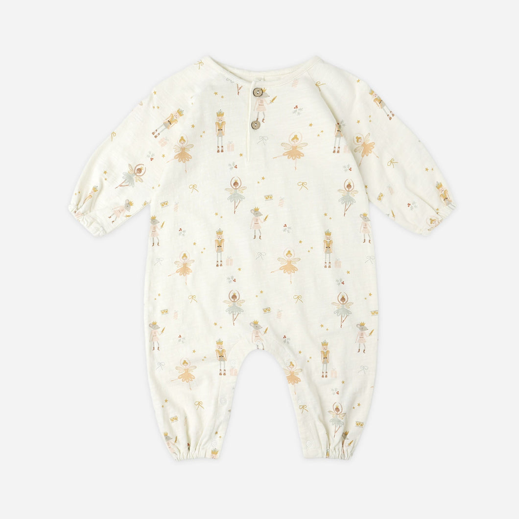 Baby onesie with a subtle pattern on a white background