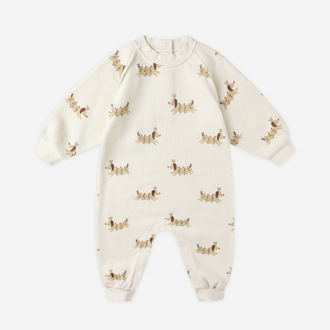 Baby onesie with dog pattern on a white background