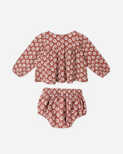 Load image into Gallery viewer, Floral patterned baby outfit on a white background