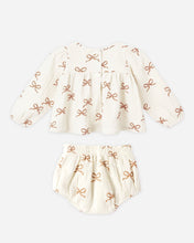 Load image into Gallery viewer, Baby outfit with top and shorts on a white background