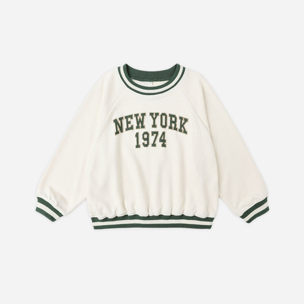 White sweatshirt with 'New York 1974' text on a white background