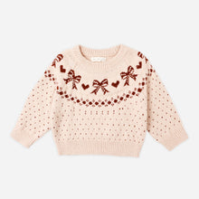 Load image into Gallery viewer, Pink sweater with bow pattern on a white background