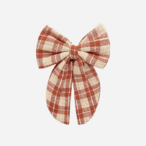 Plaid bow on a white background