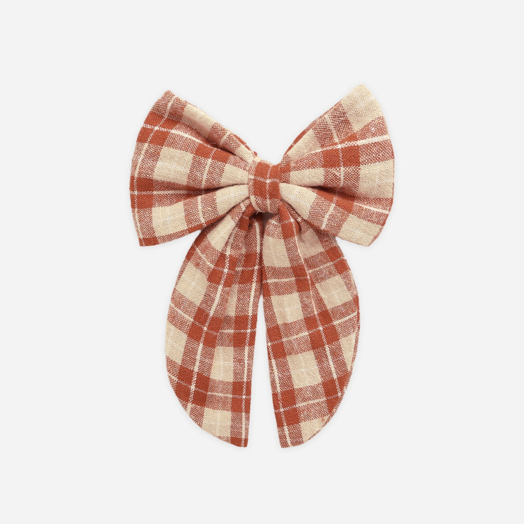 Plaid bow on a white background