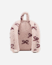 Load image into Gallery viewer, Pink textured bag with floral patterns on a white background