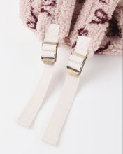Load image into Gallery viewer, Close-up of a pink textured fabric with a white strap and gold buckle on a light background