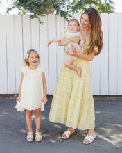 Load image into Gallery viewer, Rylee+Cru Marina Dress Ivory displayed on a model, featuring a flowy, sleeveless design perfect for casual or summer wear