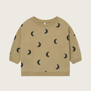 Beige sweatshirt with black moon pattern on a beige background