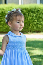 Load image into Gallery viewer, Maud smocked dress by Kidiwi in cornflower blue striped fabric, showing the dress's smocked bodice and playful stripe pattern.