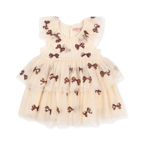 Beige dress with brown bow patterns on a white background