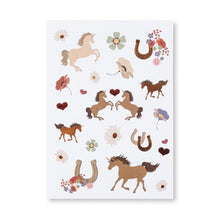 Load image into Gallery viewer, Sheet of temporary tattoos with horse designs on a white background