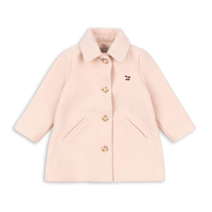 Pink coat with gold buttons on a white background