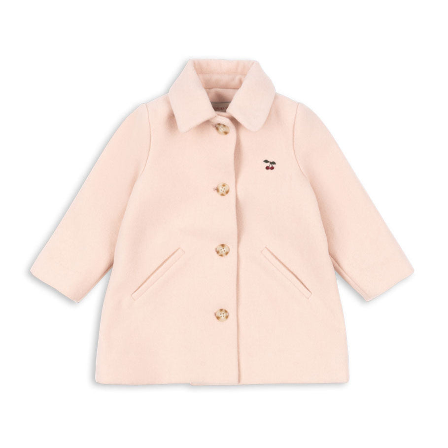Pink coat with gold buttons on a white background