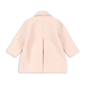 Light pink coat on a white background
