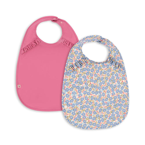 Two baby bibs, one pink and one with a floral pattern, on a white background.